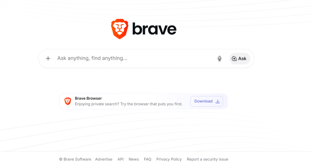 Brave Search engine homepage displaying a minimalist design with a central search bar and a prompt to download Brave Browser.