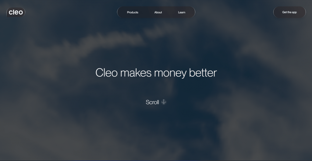 Web page landing screenshot for Cleo set against a dark cloudy background, featuring the headline "Cleo makes money better", navigation links for Products, About, and Learn, a "Get the app" button, and a "Scroll" prompt with a directional icon.